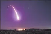  ?? STAFF SGT. J.T. ARMSTRONG — U.S. AIR FORCE ?? An unarmed Minuteman 3intercont­inental ballistic missile test launch at Vandenberg Air Force Base.