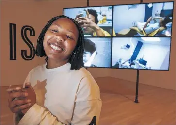  ?? Mark Boster Los Angeles Times ?? MARTINE SYMS’ “She Mad” video anchors her installati­on at the Hammer Museum’s third biennial.
