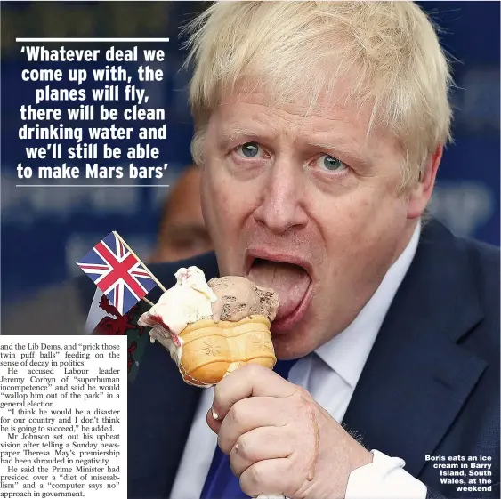  ?? Picture: FRANK AUGSTEIN/PA ?? Boris eats an ice cream in Barry Island, South Wales, at the weekend