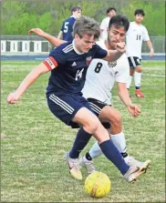  ?? Michelle Petteys, Heritage Snapshots ?? Heritage’s Joseph Smith battles against Calhoun’s Paco Pena during last week’s match. The Generals were edged out, 3-2, but qualified for the Class AAAA state tournament and will open the playoffs at Marist this week.