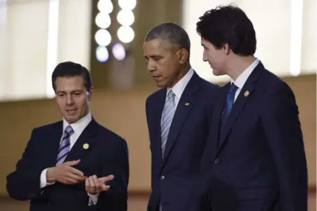  ?? SUSAN WALSH/THE ASSOCIATED PRESS FILE PHOTO ?? Justin Trudeau’s popularity in the United States may help him play the role of “honest broker” between Barack Obama and Enrique Pena Nieto.