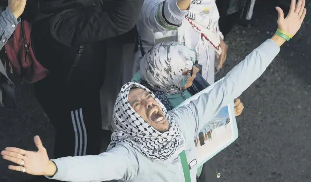  ?? PICTURE: GETTY IMAGES ?? 0 A pro-palestinia­n protester chants slogans against the US and Israel yesterday during a demonstrat­ion in Rabat, the Moroccan capital