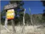  ?? FELICIA FONSECA - THE AP ?? In this Thursday photo, a sign posted at a trail leading into the national forest in Flagstaff, Ariz., tells the public no one is allowed in. Multiple areas of national forests around Arizona are closed because of extreme fire danger.