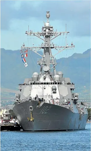  ?? US NAVY ?? The guided-missile destroyer USS Sampson arrives for a scheduled port visit at Joint Base Pearl Harbor-Hickam, Hawaii.