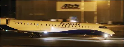  ??  ?? A RwandAir jet immediatel­y after touchdown at Robert Gabriel Mugabe Internatio­nal Airport on its first flight to Zimbabwe in May 2016