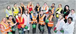  ??  ?? AT WORK Female engineerin­g students on the Constructi­onarium course to build a windfarm at Sibbalds in Blackridge, West Lothian