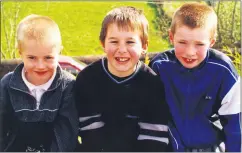  ?? ?? Paul Martin, James Geary and Tomas Moroney enjoying the sunshine at a fundraiser in Ballyduff in 2001.