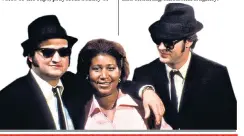  ??  ?? Aretha Franklin, right, in a publicity shot with John Belushi and Dan Aykroyd from the 1980 film The Blues Brothers, in which she sang the up-tempo song Think