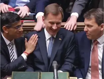  ?? ?? Rough ride: Jeremy Hunt and Rishi Sunak after his Autumn Statement yesterday