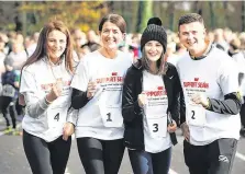  ?? PHOTO: STEVE HUMPHREYS ?? Seán Cox’s wife Martina and children Emma, Shauna and Jack at the Support Seán fun run last week.