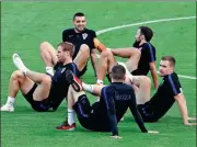  ?? SERGEI KARPUKHIN / REUTERS ?? Croatia players stretch during training in Moscow on Monday ahead of Wednesday’s World Cup semifinal against England.