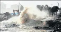  ?? PICTURE: COURTNEY AFRICA ?? OCEAN FURY: Waves bash the seafront at Sea Point.