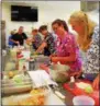  ??  ?? School food service workers get hands-on lessons during the “Loading Dock to Lunch Line” two-day workshop at SUNY Cobleskill Aug. 6-8, 2018.