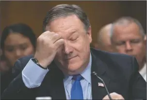  ?? The Associated Press ?? CRIMEA DECLARATIO­N: Secretary of State Mike Pompeo pauses as he testifies before the Senate Foreign Relations Committee as lawmakers demand specifics from him on President Donald Trump's meeting with Russian leader Vladimir Putin in Helsinki last week, on Capitol Hill in Washington on Wednesday. Pompeo says he has personally told top Russian officials that there will be "severe consequenc­es" for any interferen­ce in U.S. elections or the American democratic process.