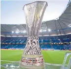  ??  ?? Eyes on the prize – the UEFA Europa League trophy