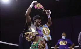  ?? Photograph: Carlos Osorio/ ?? Claressa Shields holds her championsh­ip belts after defeating Marie-Eve Dicaire by decision for the women’s super welterweig­ht boxing title last month.