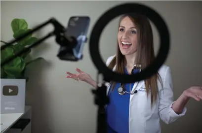  ?? Katie Hayes Luke, © The New York Times Co. file ?? Dr. Danielle Jones, a gynecologi­st who has racked up more than 11 million views on TikTok, works on a health video at her home in College Station, Texas, on Jan. 30.