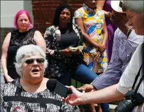  ?? AP/STEVE HELBER ?? Susan Bro speaks to reporters Monday in Charlottes­ville, Va., after the sentencing of her daughter’s killer. During earlier remarks in court, Bro said she hopes James Alex Fields Jr. finds “reclamatio­n” but also hopes “he never sees the light of day outside of prison.”