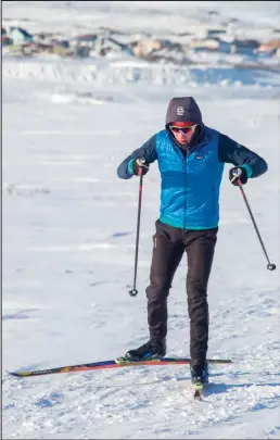  ??  ?? SMOOTH SKATER (photo top)— Tobin Hobbs showed the skiers what fast looks like.
TWO MORE FAST GUYS (photo left)— Wilson Hoogendorn and Jeff Collins finish a short but cold two miler.