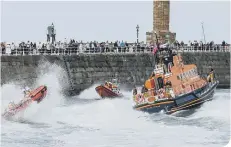  ??  ?? Whtby and Staithes lifeboats in a demo at Whitby Flag Weekend.