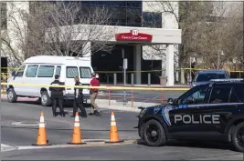  ?? SARAH A. MILLER/IDAHO STATESMAN — FOR THE ASSOCIATED PRESS ?? A police vehicle is parked outside Saint Alphonsus Regional Medical Center in Boise,