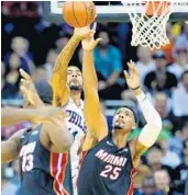  ?? JAMIE SQUIRE/GETTY IMAGES ?? Forward Jordan Mickey (25) closed with eight points during the Heat’s win over the Pacers on Saturday.