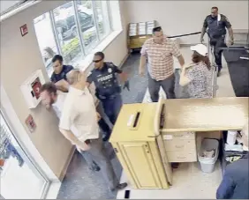  ??  ?? In this series of frame grabs, starting from top left, from security camera footage shows Jason Daigneault of Schenectad­y, right, become frustrated and throw a plastic security bin after being asked to wear a mask before entering the Schenectad­y County Social Services building during a visit this summer with his mother, Cheryl. At top right, Daigneault being hit with a radio by Schenectad­y law enforcemen­t officers. Above left, Daigneault is taken down and handcuffed, and finally, removed from the premises.