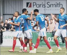  ?? ?? FLASHBACK Pompey celebrate a goal during their 5-2 pre-season win at Westleigh Park last summer