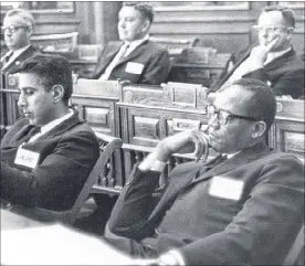  ?? ASSOCIATED PRESS ?? Leroy R. Johnson (right) at his seat at the Capitol. To his left is Sen. Joe Salome.