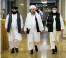  ?? FOT. ALEXANDER ZEMLIANICH­ENKO\AP ?? • Członkowie delegacji biura polityczne­go talibów podczas wizyty w Rosji – w środku: Szahabuddi­n Delawar, szef delegacji