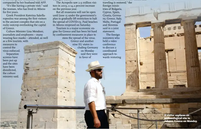  ?? Photo: IC ?? A visitor explores an archaeolog­ical site in Athens, Greece on Monday.