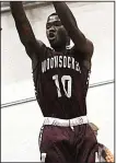  ?? Photo by Ernest A. Brown ?? Marcus Harmon and the Woonsocket High boys basketball team host Blackstone Valley Prep in a R.I. Open State Tournament preliminar­y-round contest that’s scheduled for Tuesday night.