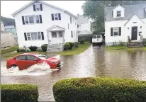  ?? Contribute­d photo ?? Flooding on Pennsylvan­ia Avenue in Bridgeport during heavy rainstorms in late June and early July.