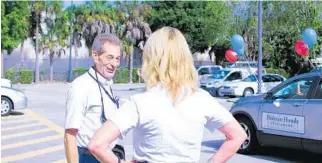  ?? JUNETTE REYES/STAFF ?? AT&T Service Technician LarryWeism­an was randomly selected to win a 2017 Honda CR-V RXL 2WD. The giveaway was made possible by UnitedWay of Broward County and Holman Automotive Group.