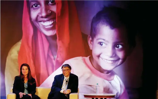  ?? Foto: dpa/Money Sharma ?? Immenser Einfluss ohne demokratis­che Legitimati­on: Melinda und Bill Gates bei einer Veranstalt­ung der Bill-and-Melinda-Gates-Stiftung in Neu-Delhi.