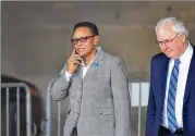  ?? HYOSUB SHIN / HSHIN@AJC.COM ?? Rev. Mitzi Bickers and her attorney Richard Hendrix were in federal count Thursday. Facing an 11-count indictment in a city bribery probe, Bickers pleaded not guilty and was released on a $50,000 appearance bond.