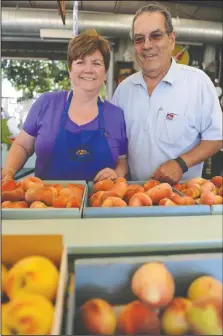  ??  ?? Fruit Bowl owners Denene and Ralph Lucchetti at the Fruit Bowl in Stockton on Friday. Ralph is the son of the original owners.