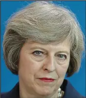  ??  ?? Power hair: Theresa May