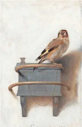  ?? MAURITSHUI­S/THE HAGUE ?? “The Goldfinch” painting is central to the novel of the same name, which is now a movie.