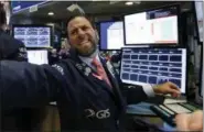  ?? RICHARD DREW — ASSOCIATED PRESS ?? Specialist Michael Pistillo works on the floor of the New York Stock Exchange on Tuesday.