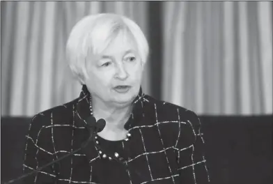  ??  ?? Interest Rates: Federal Reserve Chair Janet Yellen addresses the Executives' Club of Chicago on Friday, in Chicago. Yellen signaled that the Fed will likely resume raising interest rates later this month to reflect a strengthen­ing job market and...