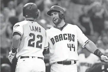  ?? ROB SCHUMACHER/ AZCENTRAL SPORTS ?? The D-Backs’ Paul Goldschmid­t (44) celebrates after Jake Lamb hit a two-run home run against the Chicago White Sox in the first inning on Tuesday night at Chase Field.