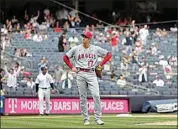  ?? ADAM HUNGER / AP ?? Los Angeles Angels pitcher Shohei Ohtani reacts after giving up a home run to New York Yankees’ Gleyber Torres during the first inning of the first baseball game of a doublehead­er on Thursday in New York.