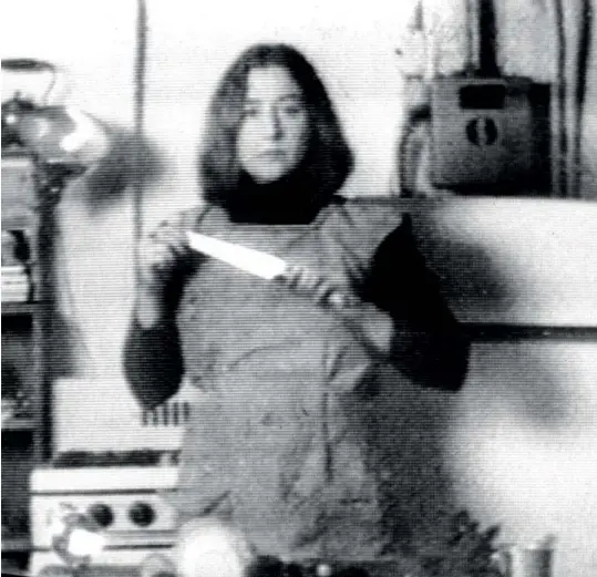  ??  ?? Above: Martha Rosler, Semiotics of the Kitchen, 1975 (still); black and white video with sound; 6’ 33’’. © Martha Rosler.
Right page: Martha Rosler, Kitchen I, or Hot Meat, from the series “Body Beautiful, or Beauty Knows No Pain,” c. 1966–72; photomonta­ge. © Martha Rosler.