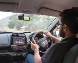  ??  ?? Facing page top: Kicking up dust wherever we go. Facing page,
bottom: 5-min long ferry ride to the nearest ATM. Right: Even six hours behind the wheel proved to be a non-issue in the KWID