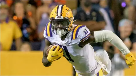  ?? MATTHEW HINTON — THE ASSOCIATED PRESS ?? LSU wide receiver Brian Thomas Jr. runs during an NCAA football game against Auburn on Saturday, Oct. 2, 2021in Baton Rouge, La.