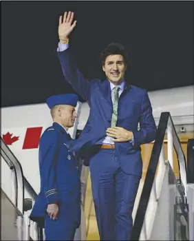  ?? CP PHOTO ?? Prime Minister Justin Trudeau arrives in Stansted, England on Tuesday.
