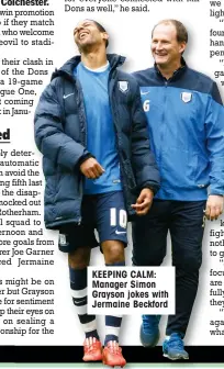  ??  ?? KEEPING CALM: Manager Simon Grayson jokes with Jermaine Beckford