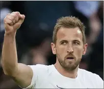  ?? MATT DUNHAM — THE ASSOCIATED PRESS ?? Tottenham’s Harry Kane celebrates after scoring a penalty kick against Arsenal at Tottenham Hotspur stadium in London on Thursday.