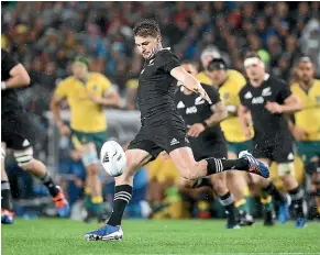  ?? GETTY IMAGES ?? The All Blacks lifted the cup in 2011 and 2015, above left. Beauden Barrett, above right, will be key to the prospect of a historic three-peat.